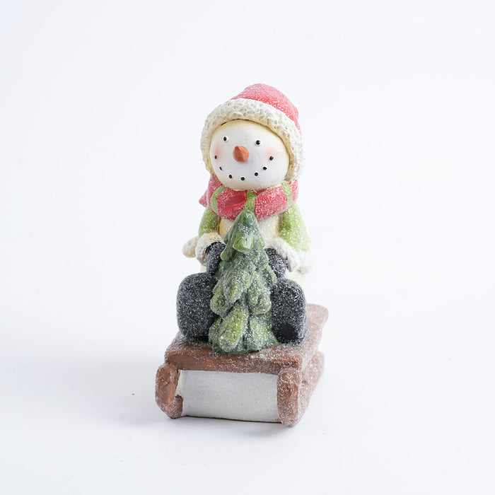 Christmas Snowman on Sled Figurine Showpiece