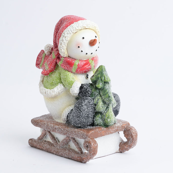 Christmas Snowman on Sled Figurine Showpiece