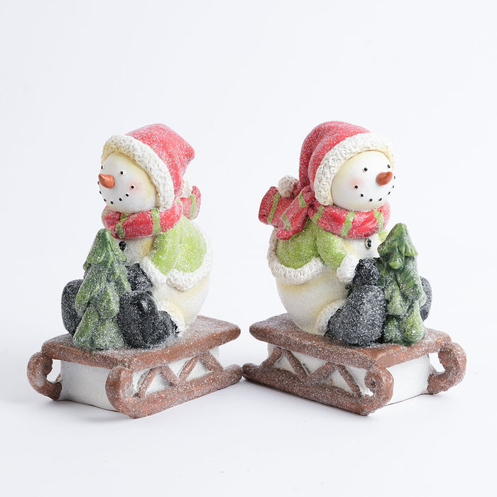 Christmas Snowman on Sled Figurine Showpiece