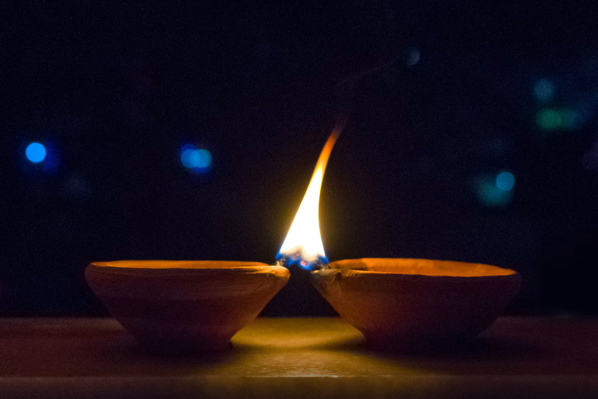 Diyas glowing warmly for Diwali